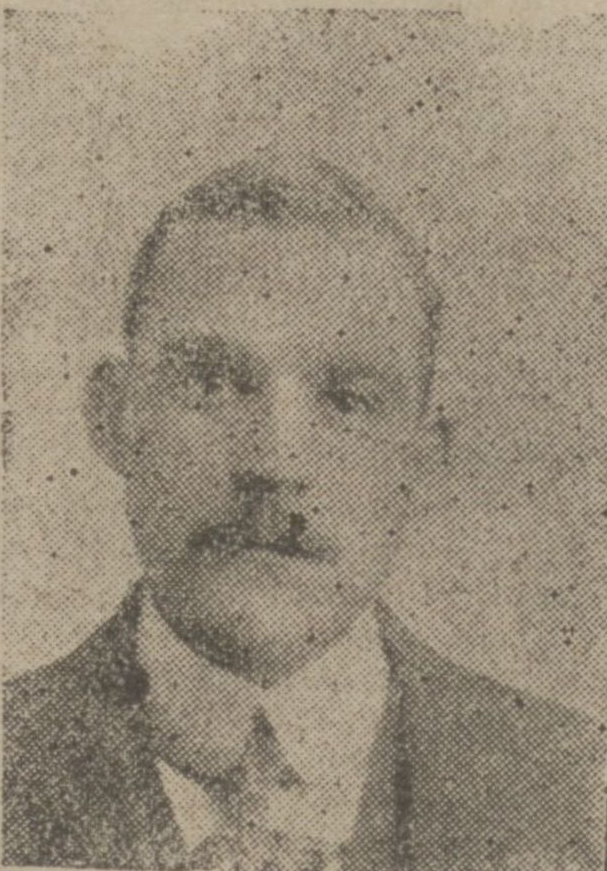 A person with a mustache Description automatically generated